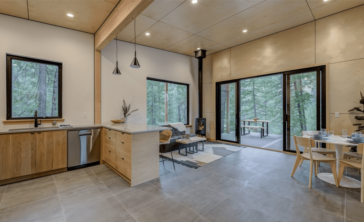 Interior view of new home showing open plan kitchen, dining and living area