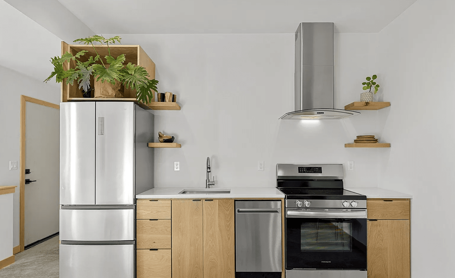 Interior of modern accessory-dwelling-unit kitchen with stainless steel appliances