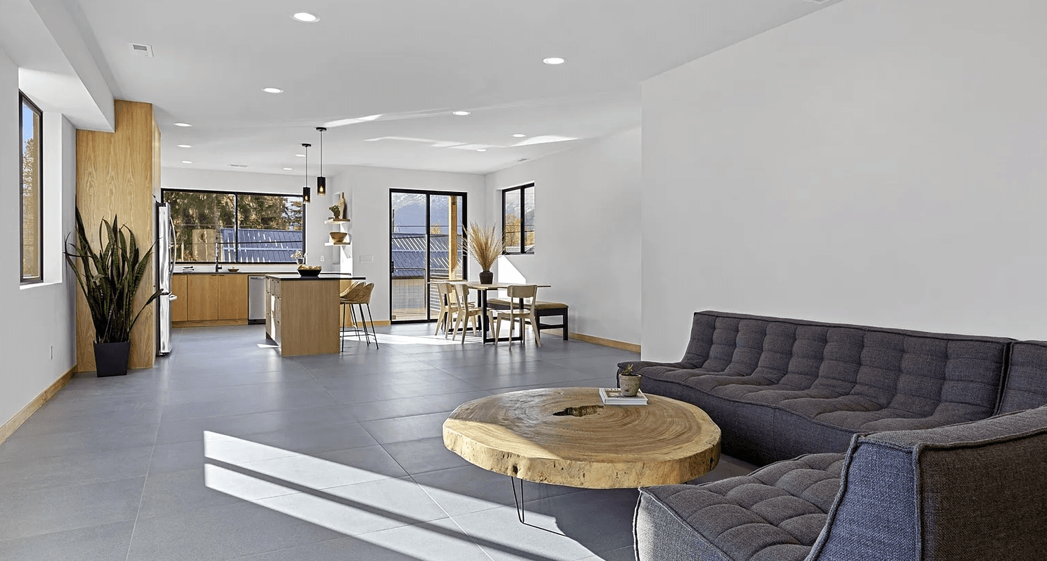 Interior of modern, newly constructed, open plan living room, kitchen and dining