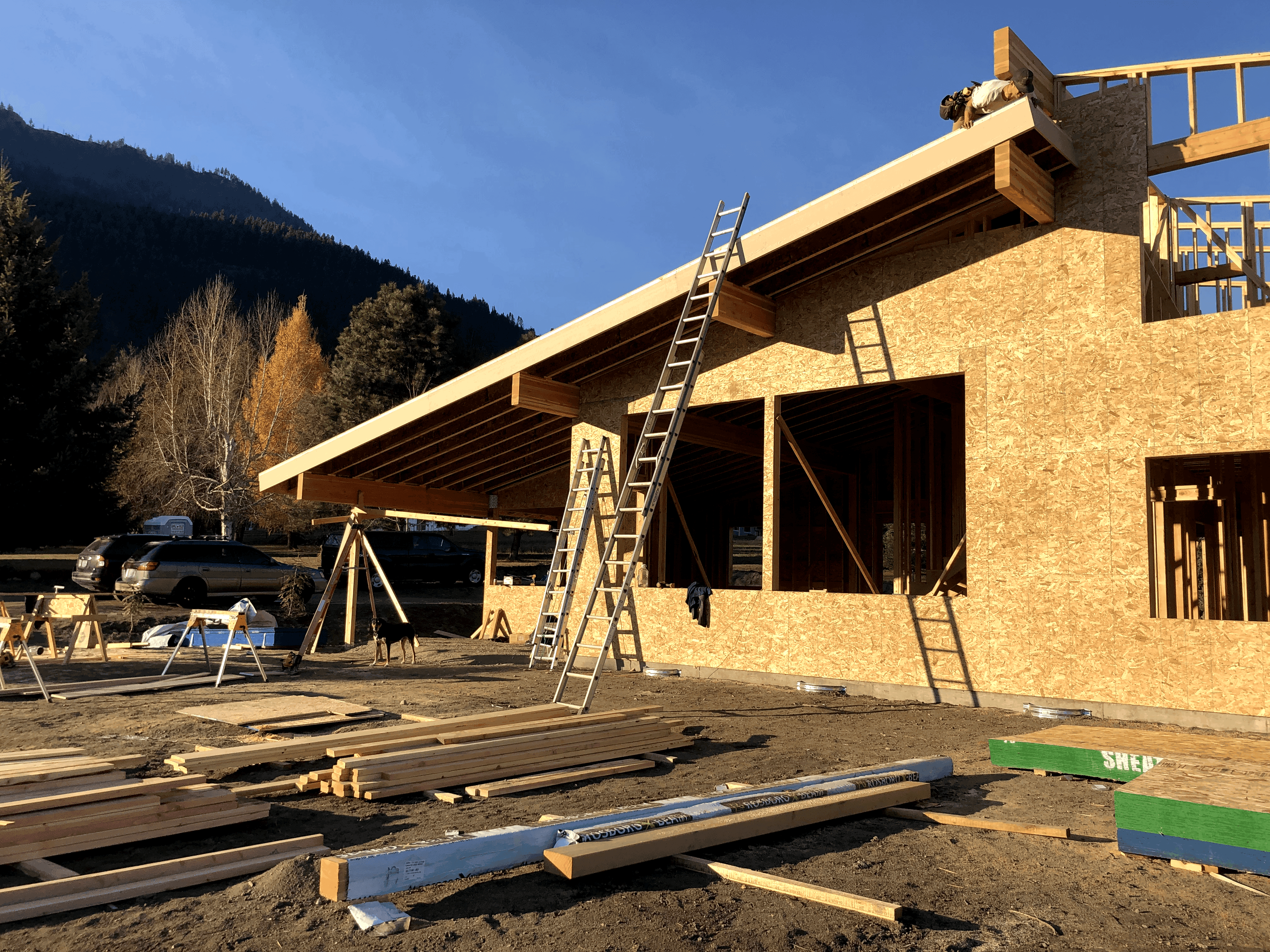 Exterior of home under construction with framing and walls complete